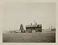 The main building of Fort Stevens (pictured 1922) was used as a lighthouse keepers residence until 1982