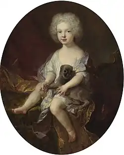 Portrait of a young boy with a dog