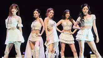 Fromis 9 in September 2025 L–R: Song Ha-young, Lee Chae-young, Lee Na-gyung, Baek Ji-heon and Park Ji-won