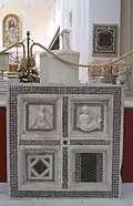 Right-hand screen and baptismal font