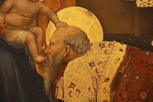 Detail of Magi kissing the feet of the Christ Child