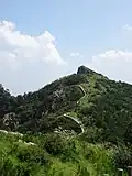 The castle walls, winding up the mountain (2004)