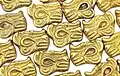 Gold appliqués in the form of a ram's head, Barrow 6 of Taksai I, Kazakhstan