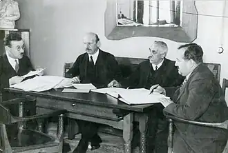 Members of the government of Liechtenstein in 1928. Sitting from the left are Josef Hoop, Peter Büchel, Josef Gassner and Ferdinand Risch.