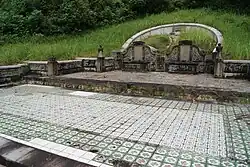 A large, ornate Chinese gravestone