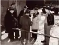 Harold Webb, in background facing camera