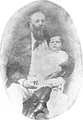Guzman with one of his daughters
