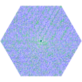 Hexagonal number spiral with prime numbers in green and more highly composite numbers in darker shades of blue
