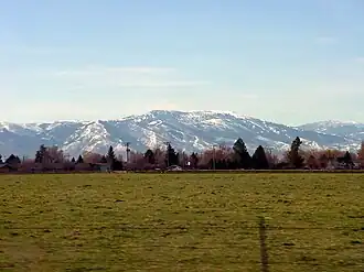 A photo of the Albion Mountains viewed from Heyburn in winter