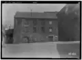 A 1934 view of the now-demolished grinding mill that stood roughly where the World War II memorial just to the northwest of where the Hyatt Regency is today