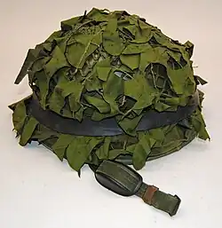 Helmet m/37 with Saab Barracuda helmet net (1990s)