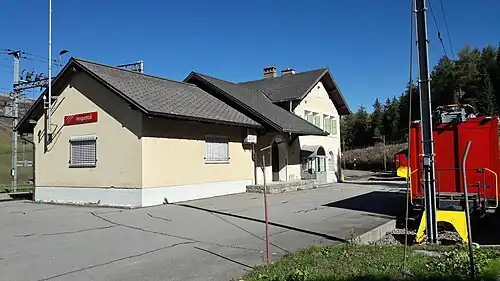 Two-story building with gabled roof