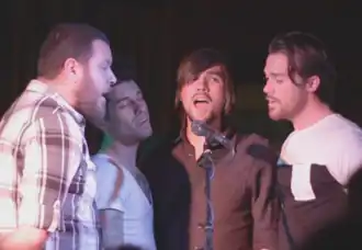 House of Heroes performing a capella in Akron, Ohio in 2012. Left to right: Eric Newcomer, Colin Rigsby, Tim Skipper, Matt Lott
