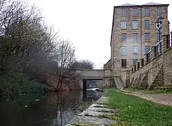 View eastward under the Commercial Street bridge to Lock 1E