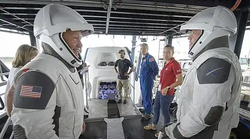 NASA astronauts Doug Hurley (left) and Bob Behnken (right) on the vessel, rehearsing Crew Dragon crew extraction with teams from NASA and SpaceX, August 13, 2019. The ship would later be named after the wife of Behnken, Megan McArthur, who would fly on the SpaceX Crew-2 mission.