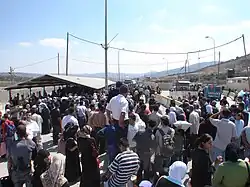 Huwwara checkpoint, south of the Palestinian city of Nablus.[47]
