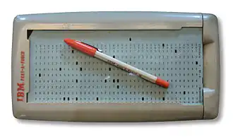 Image 9An IBM Port-A-Punch punched card