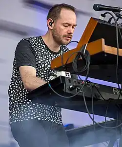 Iain Cook performing with Chvrches in 2014