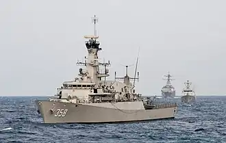 The Indonesian navy corvette KRI John Lie (358) lines up for a combined gunnery exercise behind the U.S. Navy littoral combat ship USS&nbsp;Fort Worth during the underway phase of CARAT Indonesia 2015.