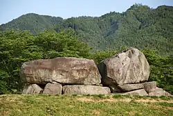 Two huge and a couple of smaller rocks.