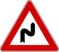 Double bend, first to the right (also uses )