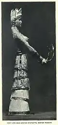 The Boston ivory and gold figure, probably a fake, pre-1914. Gold snakes coil round the arms.[15]