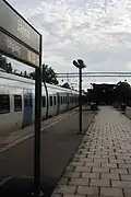 Platform at Järna with an X60 train