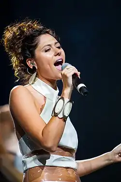 Eliza performing in 2014