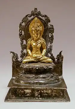 The Buddhist Goddess Tara, gold and silver, Central Java, Indonesia, c. 9th century.[74]