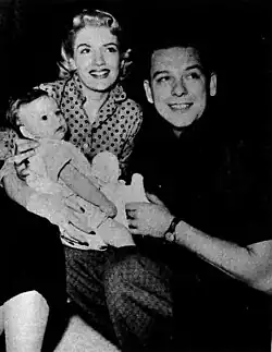 Strange (right) with his then-wife Joan O'Brien and their child, Rusty, in 1956