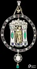 A pendant of gold and silver, set with rubies, chrysoprases, sapphires, aquamarines and opals