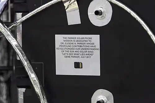 A plaque with a dedication to Eugene Parker mounted to the PSP