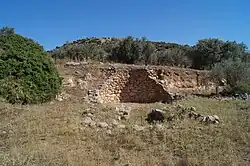 Ruins of the Kazarma tholos tomb (c.1500 BC) showing the Mycenaean beehive technique