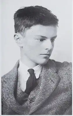 White teenage boy with neat dark hair