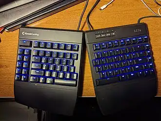 The Kinesis Freestyle (2007) adjustable split keyboard linked by a cable and removable link; additional accessories are used to adjust tenting angle or attach a handrest
