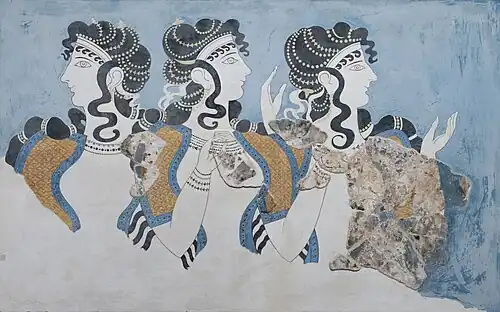 Image of the fresco, "Ladies in Blue", from the Palace of Knossos on the island of Crete, with women wearing what seems like a ponytail hairstyle.