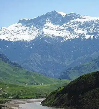 Guzun is located at the foot of the mountain. Kuh-e Kallat (Kallat Peak)
