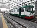 The ADe 18, named "La Prima" on occasion of its revamping, parked at the FCE Adrano Nord station.