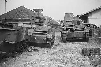 Two Light Tank Mk.VIs recaptured from the Imperial Japanese Army at a workshop in Bandung, 1946