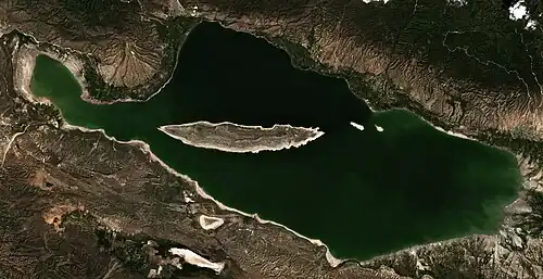 Lake Enriquillo is the biggest saltwater—hypersaline lake in the Dominican Republic. It is located in Enriquillo wetlands, and is the largest lake in both the Dominican Republic and Hispaniola, as well as the entire Caribbean. At 46-meters below sea level, it is the lowest point on the island or any island country.