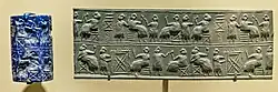 Lapis lazuli cylinder seal recovered from tomb PG 800, inscription U-bara-ge[22]