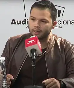 Aguilar at a press conference in 2018.