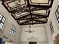 Lozano Hall with its original chandeliers[5]