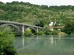 The church and bridge over the Rhône, in Lucey