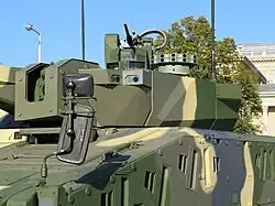 The slots on the side of the hull are sensors and charges of the StrikeShield APS.