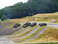 M60A3 TTSs and CM-21As climbing slopes