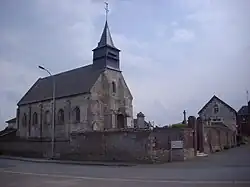 The town hall and church in Erquinvillers