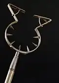 Early modern German man catcher with locking arms and inward facing spikes