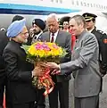 Abdullah welcomes PM Manmohan Singh on his arrival at Jammu airport in 2011.