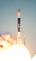 Launch photo of Mars Polar Lander being lifted into space by a Delta II launch vehicle